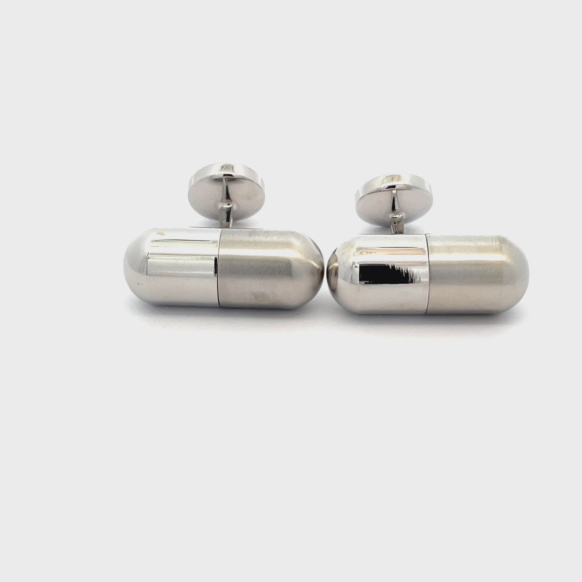 Opening Silver Capsule Cufflinks